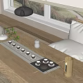 Minimalist Tea Set Arrangement On Wooden Table With Natural Mat And Window View