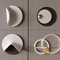 Modern Minimalist Wall Decor With White Black Circular Shapes And Gold Metallic Rings