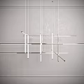 Modern Metal Chandelier with Linear Geometric Design Hanging from Ceiling in Minimalist Interior