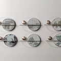 Stylish Circular Wall Decor Multiple Pieces with Various Patterns Mounted on Light Gray Wall 3d model