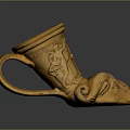 Carved Ceramic Cup With Ram Head Design And Intricate Decorative Motifs
