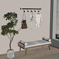 Minimalist Modern Indoor Entryway with Hanger Rack Clothes Bench and Potted Plant