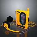 Vintage Yellow Portable Computer Device With Headphones And Tape Storage Media