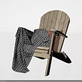 Wooden Leisure Chair With Black And White Polka Dot Blanket And Orange Cushion
