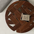 Modern Wooden Coffee Table With Geometric Interlocking Design Grey Sofa And Book On Top