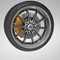Premium Stacked Tires With Black Alloy Wheels And Gold Brake Calipers