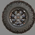 Off Road Tire With Deep Tread Pattern And Metallic Multi Spoke Wheel Rim