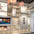 Exhibition Scene Of Harbor Workers Sculptures With City Skyline Seagulls And Projection