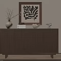 Wooden Cabinet Featuring White Vase Books Woven Basket And Black Abstract Painting On Beige Wall