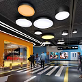 Modern Indoor Shopping Mall Parking Lot With Colorful Ceiling Lights Pedestrians And Signage