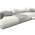 Modern Cream Multi Person Sofa With Soft Cushions And Plaid Blanket