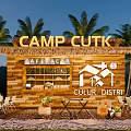 Wooden Cabin Cafe with Thatched Roof Palm Trees and Outdoor Seating at Camp Cutk