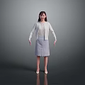 A Woman Standing In Gray Background Wearing White Cardigan And Lace Skirt With High Heels