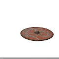 Ancient Round Shield Weapon with Red Surface Intricate White Decorative Patterns Metal Center Riveted Edge 3d model