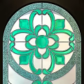Stained Glass Panels With Repeated Floral Patterns Symmetrical Design in Blue and Green Tones