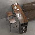 Wooden Bar Counter with Wine Glasses Coffee Cup Laptop and Wooden Stools by Brown Sofa