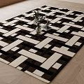 Black And White Geometric Pattern Square Carpet On Wooden Floor With Vase And Books