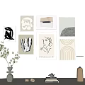 Minimalist Modern Wall Gallery With Various Artworks And Table Decor Items 3d model