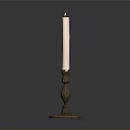 White Candle On Decorative Brass Candlestick With Ornate Pedestal Base