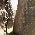 Natural Garden Landscape With Towering Rock Walls Narrow Passage And Sunlight