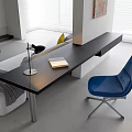 Modern Black Desk With Blue Chair Table Lamp And Yellow Book