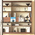 Wooden Bookcase With Multiple Shelves Displaying Books Decorative Items Photo Frames And Bowls