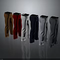 Various Colored Pants with Black Belts on Grey Smooth Surface