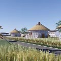 Scenic Countryside Landscape With Haystacks Round Roofed Huts And Wheat Fields Along The Road