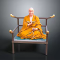 Game Movie Monk Character In Yellow Robe Sitting On Wooden Chair With Prayer Beads