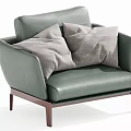 Modern Green Leather Single Sofa With Two Gray Pillows And Wooden Legs Design