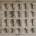 Decorative Column Capitals with Various Intricate Classical Designs Arranged on Wall