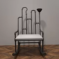 Stylish Black Frame Rocking Chair With White Cushion On Wooden Floor