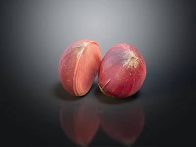 Two Red Chestnuts With Textured Surface On Black Background And Reflection 3d model