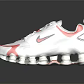 White And Red Nike Running Shoes With Cushioned Sole And Sporty Logo Design