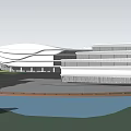 Modern Architectural Complex Featuring Curved White Building Green Roof Stadium Pond And Circular Plaza