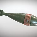 Green Cylindrical Military Weapon With Metal Body Copper Bands And Fins
