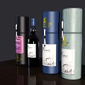 Luxury Wine Bottle And Glasses With Decorative Colored Boxes On Wooden Table
