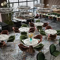 Elegant Modern Restaurant Interior With Green Bar Seats Crystal Chandeliers And Greenery