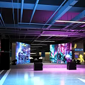 Modern Parking Garage With Colorful LED Lighting Sleek Ceiling And Reflective Floor