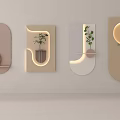 Modern Wall Hangings In Various Shapes With Green Plants And Soft Lighting
