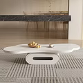 Modern White Coffee Table With Unique Shape Holding Fruit Bowl And Coffee Cup 3d model