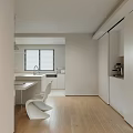 Sleek Modern Kitchen Interior With White Cabinets Countertop Window Blinds And Appliances