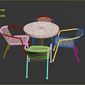 Round Marble Top Table With Four Rattan Chairs And Metal Frames