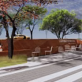 Modern Commercial Street Entrance With Yellow Cartoon Character Bicycle Green Plants And Outdoor Seating