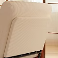 Cozy Beige Single Seater Sofa With Black Armrest Floor Lamp And Dark Cabinet Decor