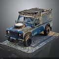 Vintage Blue Silver Off Road Vehicle With Roof Rack Front Spare Tire On Stone Pavement