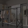 Floor Standing Clothes Rack with Hanging Clothes Quilt and Washing Machine in Indoor Laundry Area