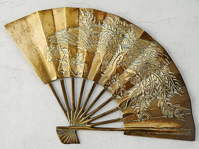 Gold Fan Shaped Wall Decor With Carved Phoenix And Intricate Patterns On White Wall 3d model