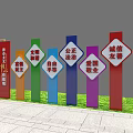 Colorful Vertical Garden Ornaments With Values Text Displayed On Green Lawn Grass