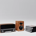Vintage Radio And Wooden Speaker Setup With Stacked CDs On Gray Background